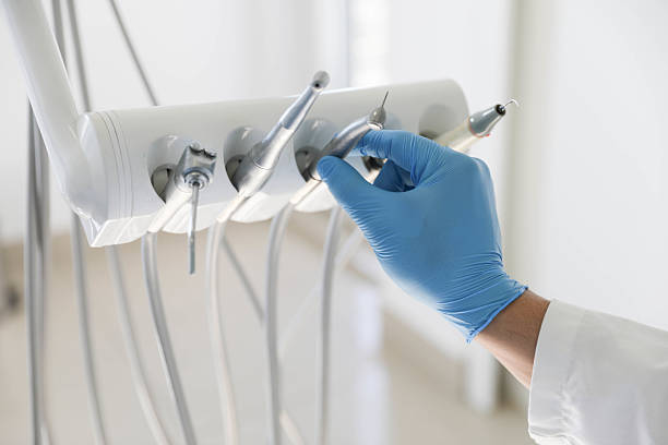 Professional Tooth Extraction technician working in Dunn, NC